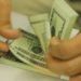 Dólar encosta em R$ 5,45 após resultados da economia americana